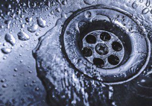 Clear Up a Stubborn Clogged Drain with These DIY Tips